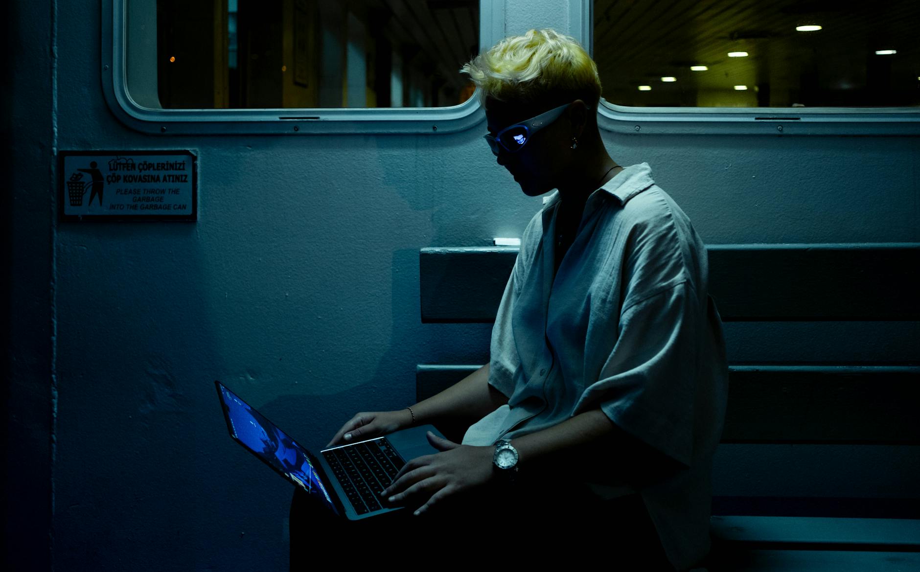 A wide shot of an empty, modern gym with natural light.